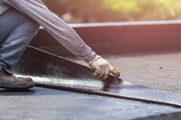 Professional Basement Waterproofing technician working in Belmont, VA